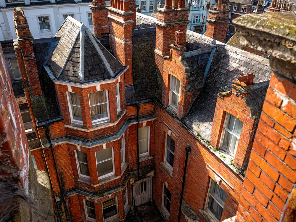 Selling a flat in poor condition - property surveyors aerial photo Block of council flats in London